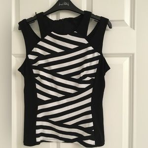 Geometric stretchy top with zipper and shelf bra